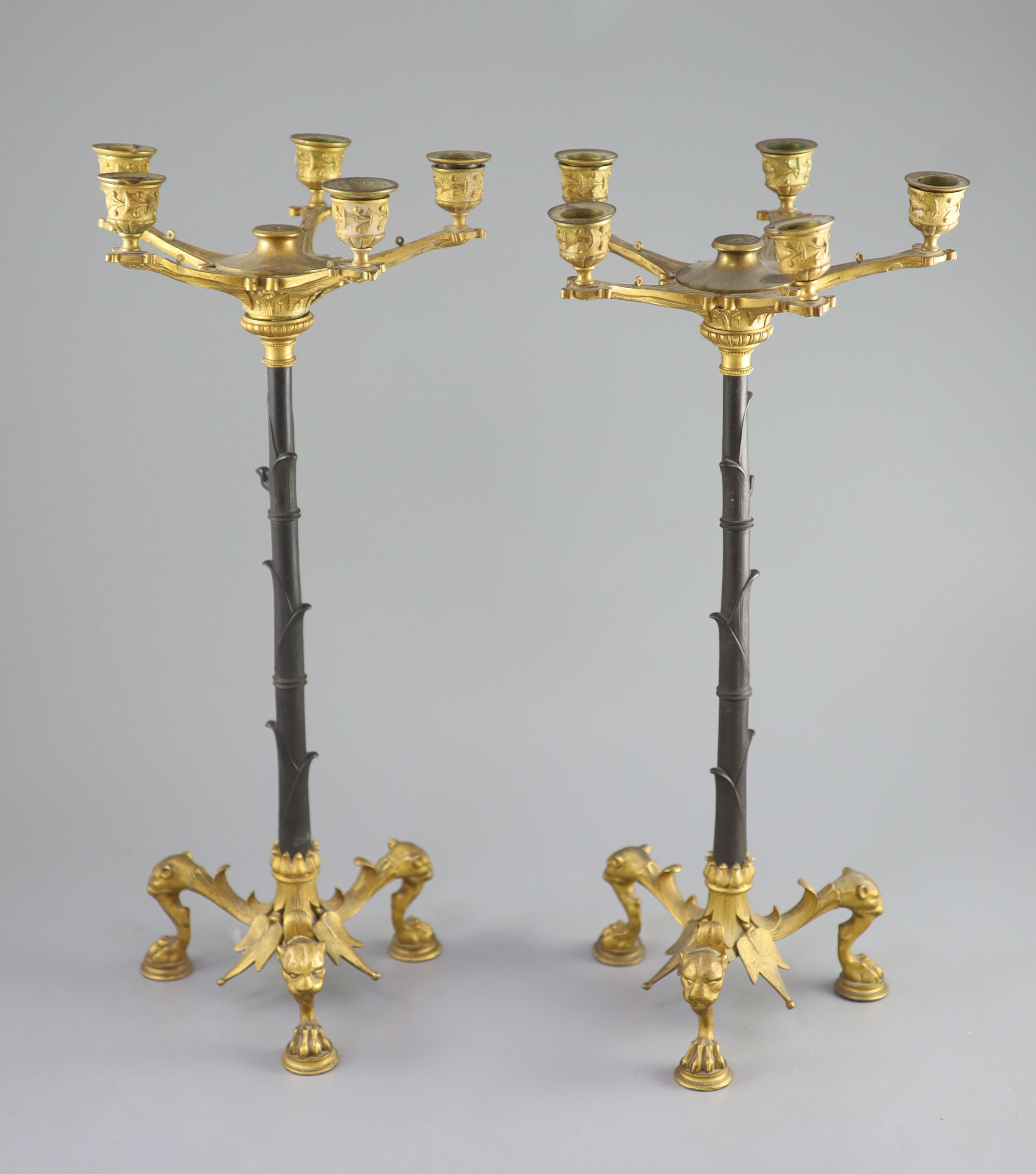 A pair of Barbedienne style five branch ormolu candelabra, 19th century, 52cm high